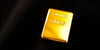 Close-up of a shiny gold bullion bar.