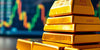 Close-up of gold bars with a financial backdrop.