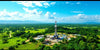 Aerial view of drilling rigs in Colombian landscape.