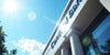 Central bank building with modern architecture and blue sky.